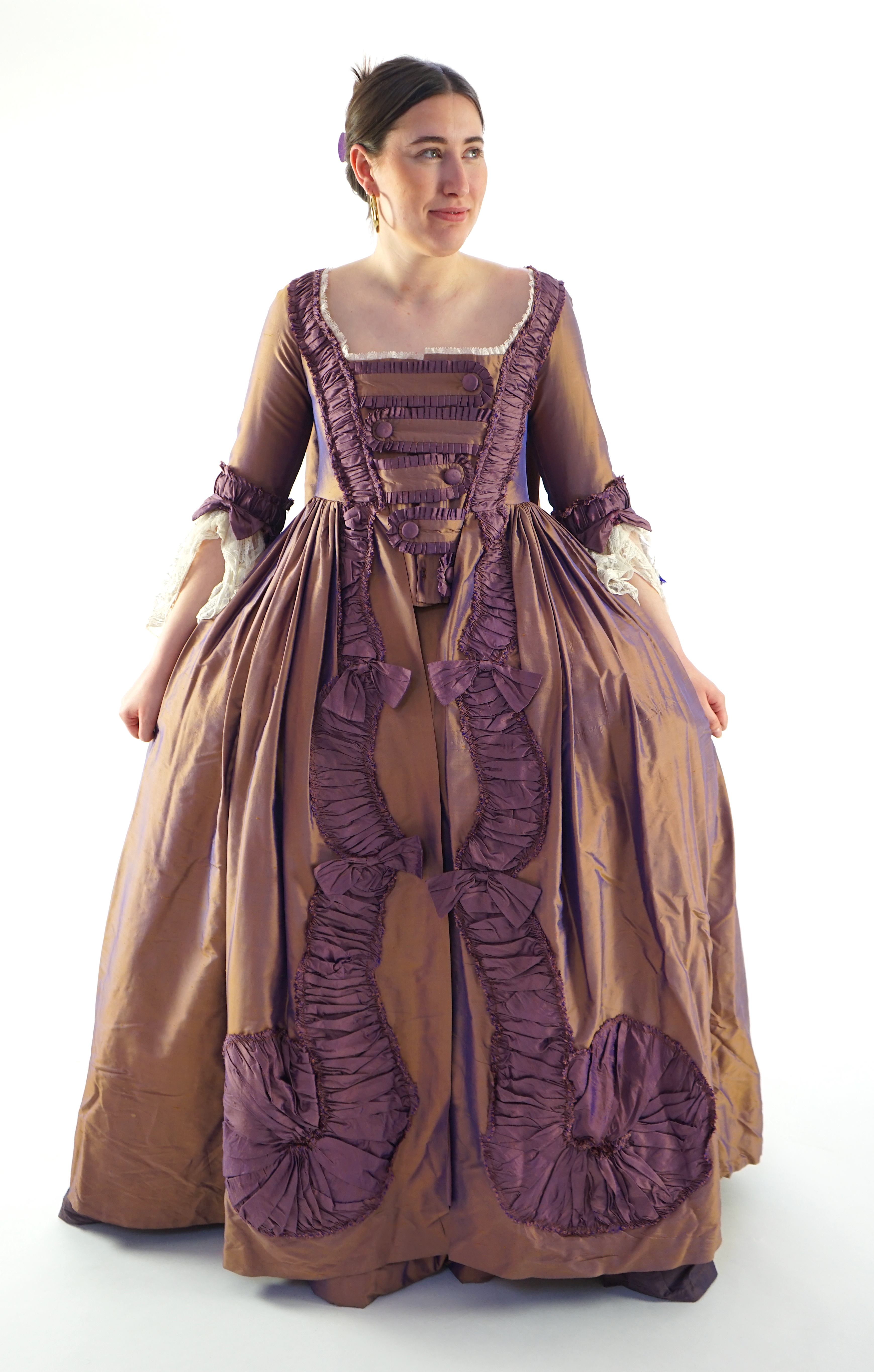 An exceptional lady's 18th century style sack dress, bronze and purple with fine lace cuffs - with skirt and pannier frame. Ex London Festival Opera 'The Magic Flute'.